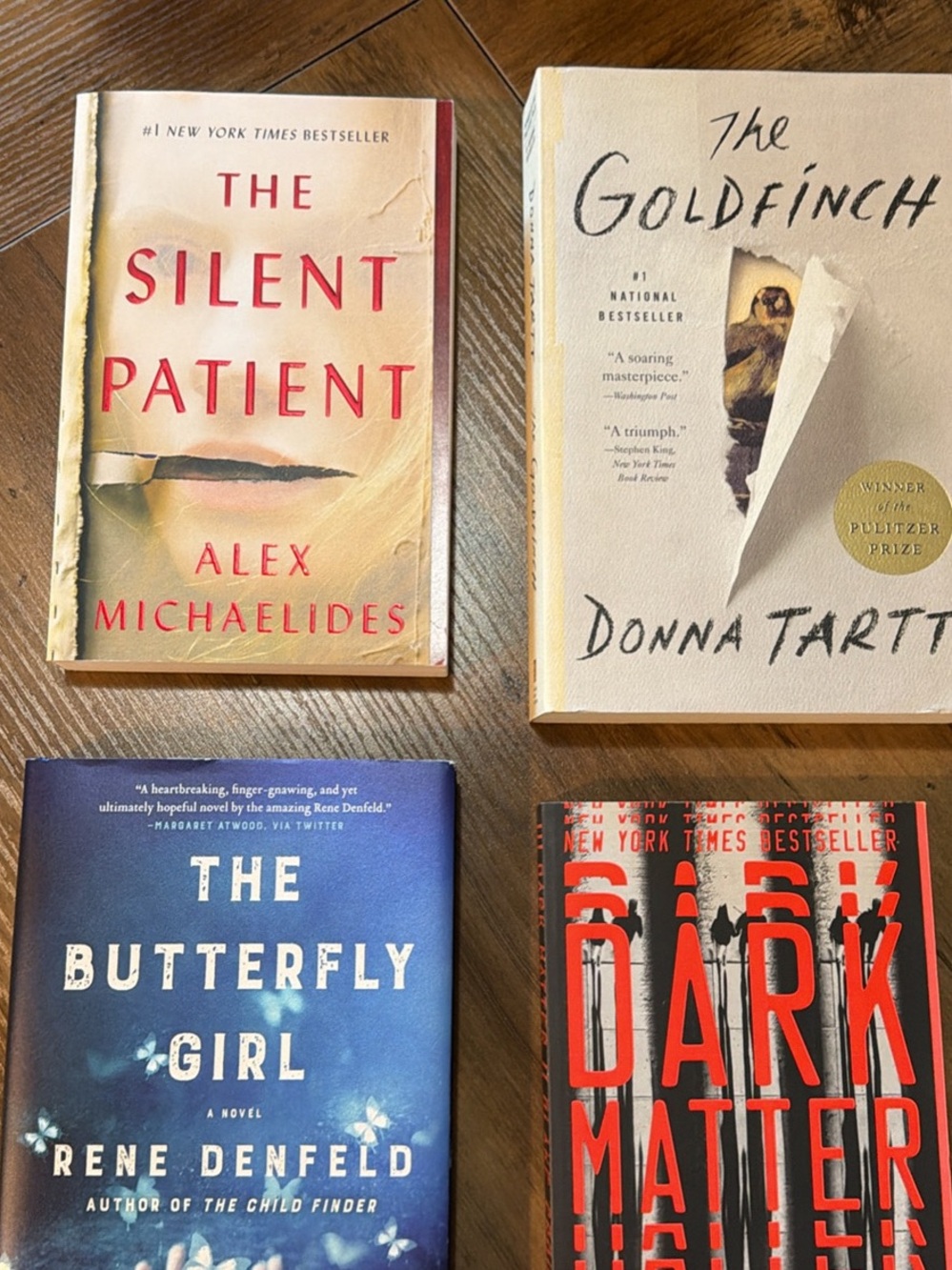 Assorted Paperback Novels - Red, Cream, Blue, and Black Covers